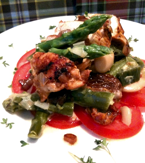 Hot roasted chicken on leek and asparagus ragout
