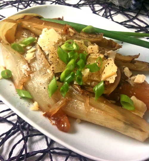 Braised chicory with goat's cheese and truffle oil